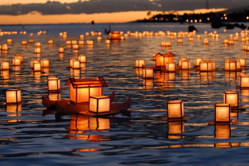 Over 1000 candlelit paper lanterns get released into the waters at twilight