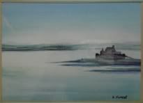 Castle Island A castle is silhouetted on a promontory into a lake